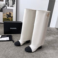 CHANEL 25S HIGH BOOTS 55MM IN IVORY BLACK CALFSKIN AND CANVAS GOLD HARDWRE