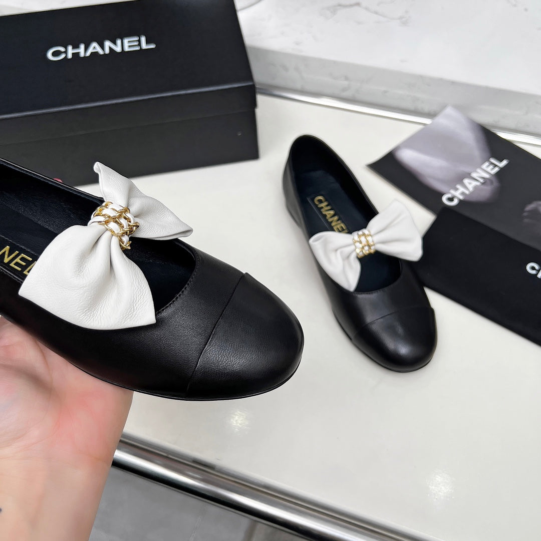 CHANEL 25S MARY JANES IN BLACK CALFSKIN WITH WHITE BOW GOLD HARDWRE