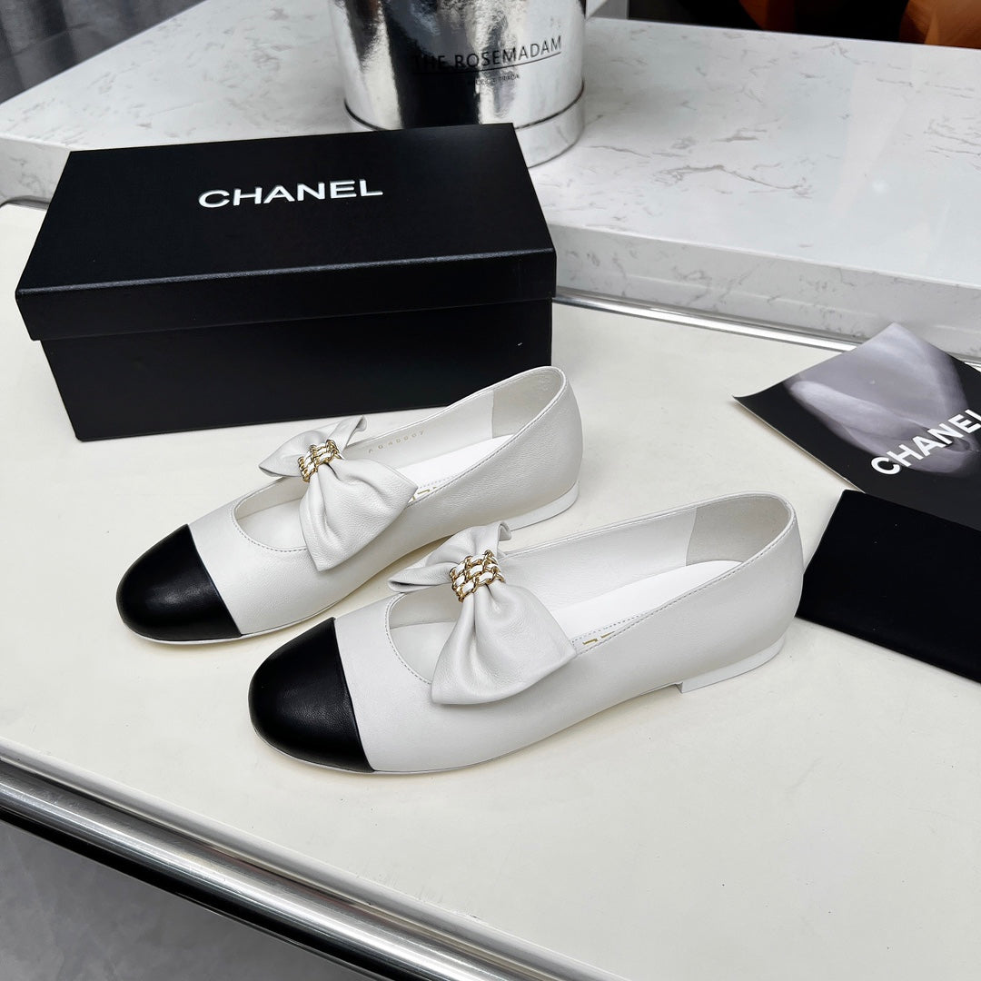 CHANEL 25S MARY JANES IN WHITE MIX BLACK CALFSKIN WITH BOW GOLD HARDWRE
